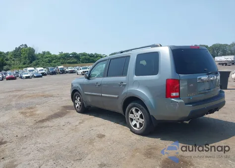 2009 Honda Pilot Touring z USA, uszkodzony, nr VIN 5FNYF48999B020578